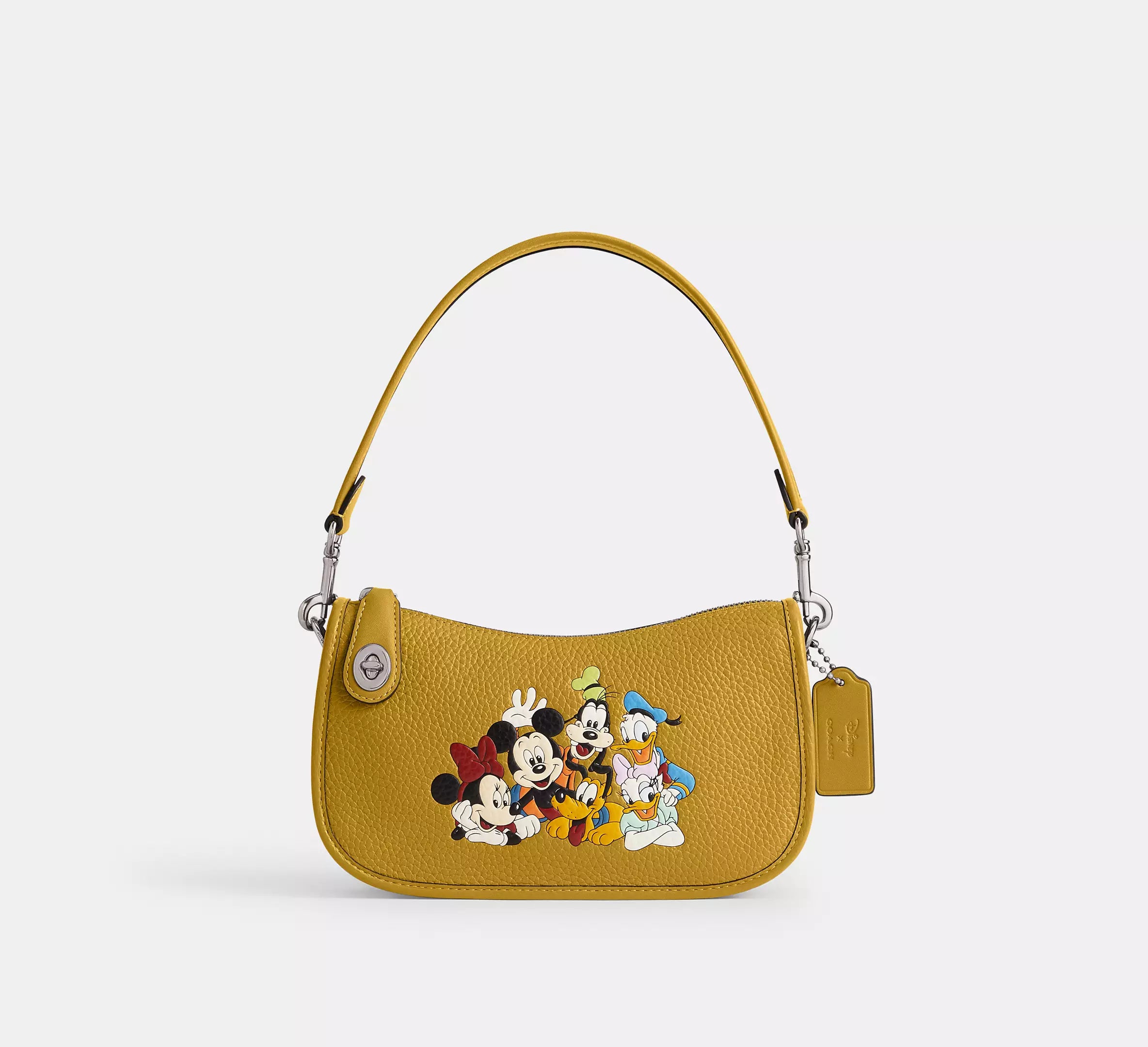 Coach Disney X Coach Swinger Bag In Regenerative Leather With