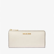 Michael Kors Jet Set Travel Large Saffiano Leather Quarter-Zip Wallet-LT CREAM