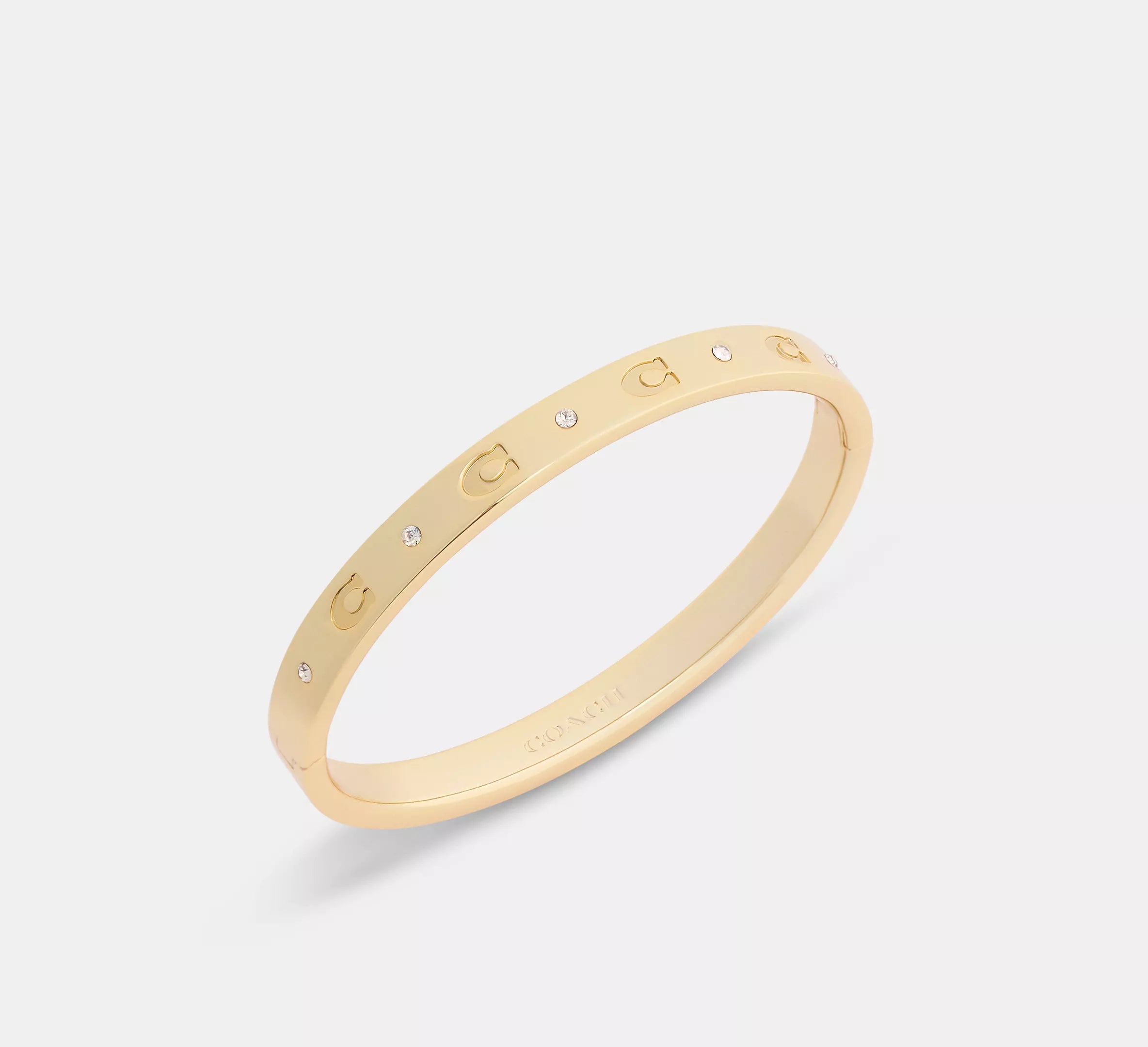 Coach Repeated C Hinged Bangle  -   Gold