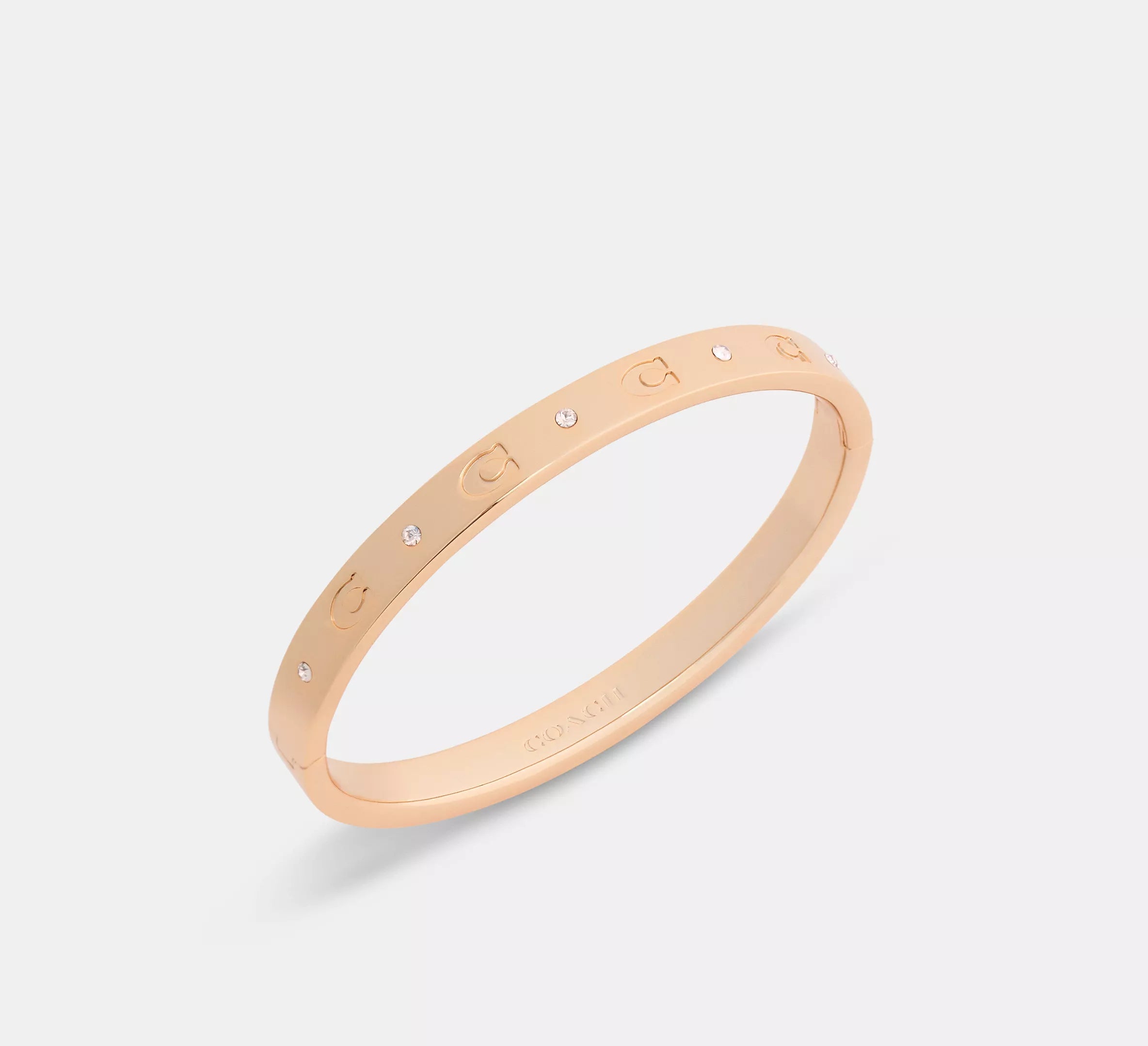 Coach Repeated C Hinged Bangle  -  Rose Gold