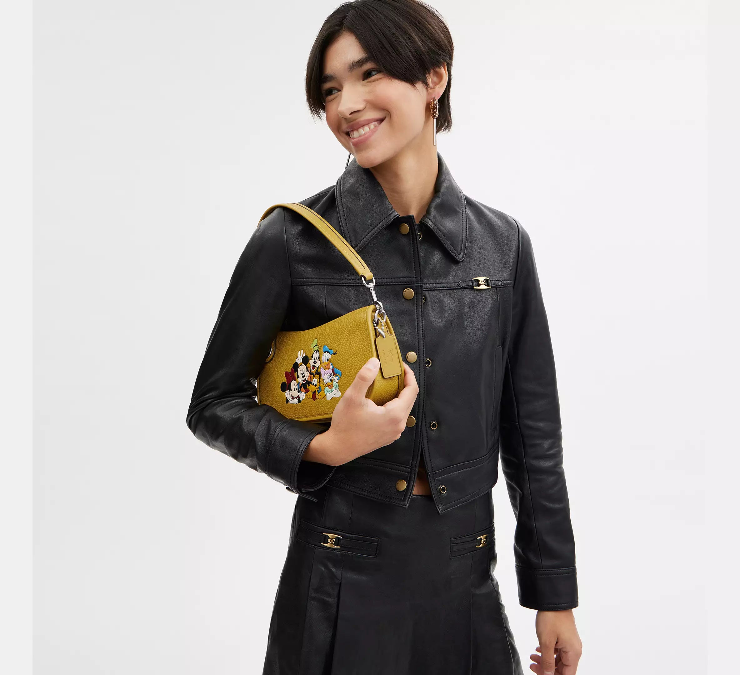 Coach Disney X Coach Swinger Bag In Regenerative Leather With