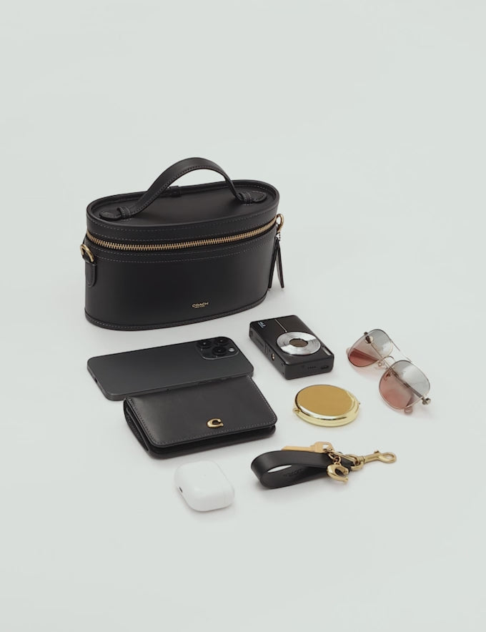 Coach Trail Bag  -  Brass/Black