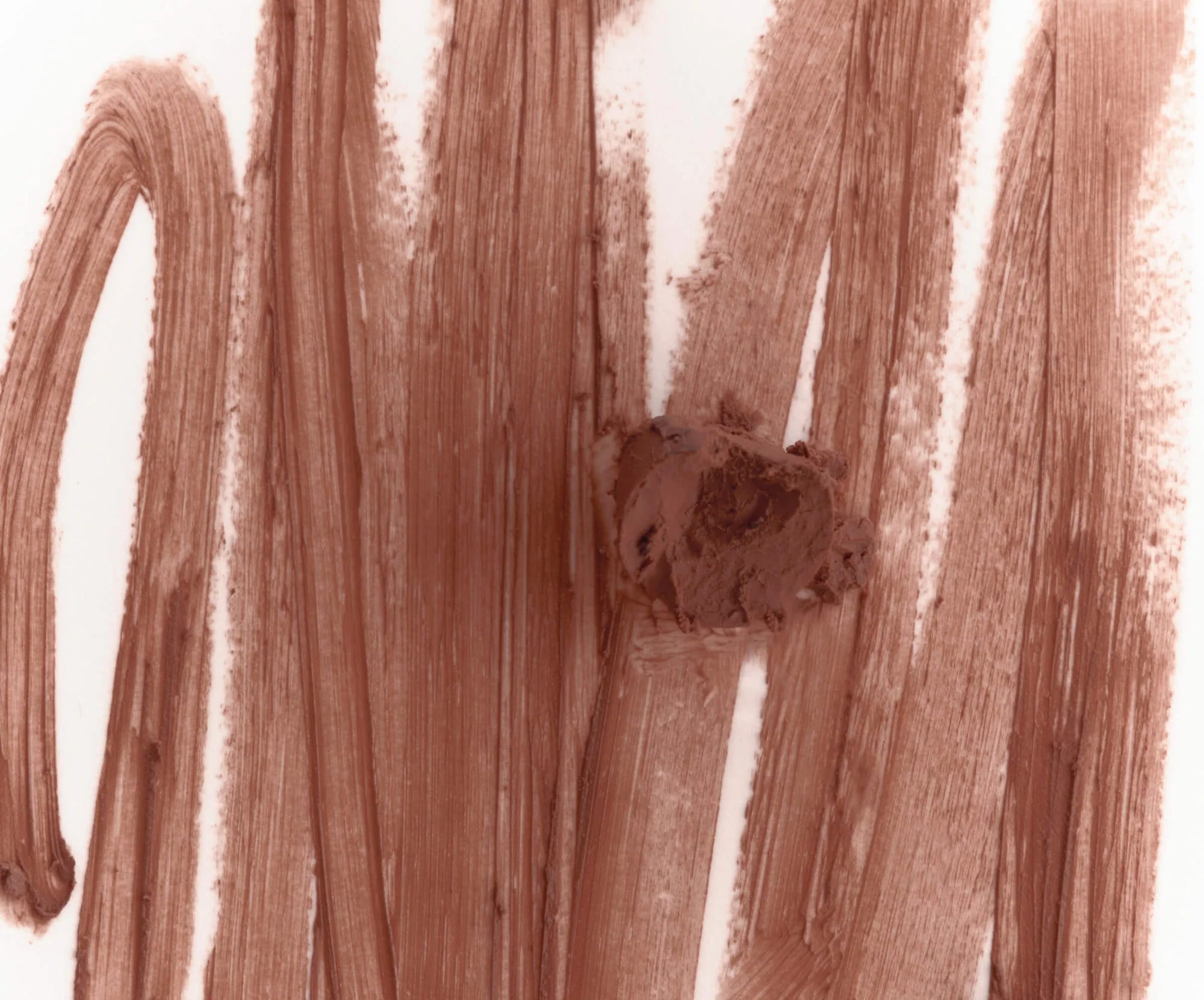 Rhode peptide lip shape -   twist -  warm taupe